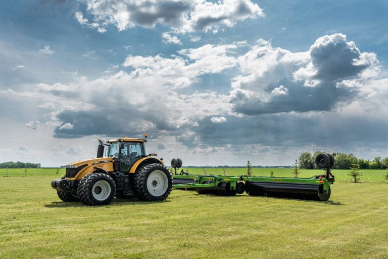 Why do farmers use land rollers?